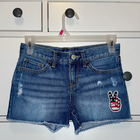 Girls jean shorts with American flag peace sign - Picture 1 of 2